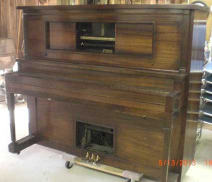 Old Upright Player Piano on a Dolly