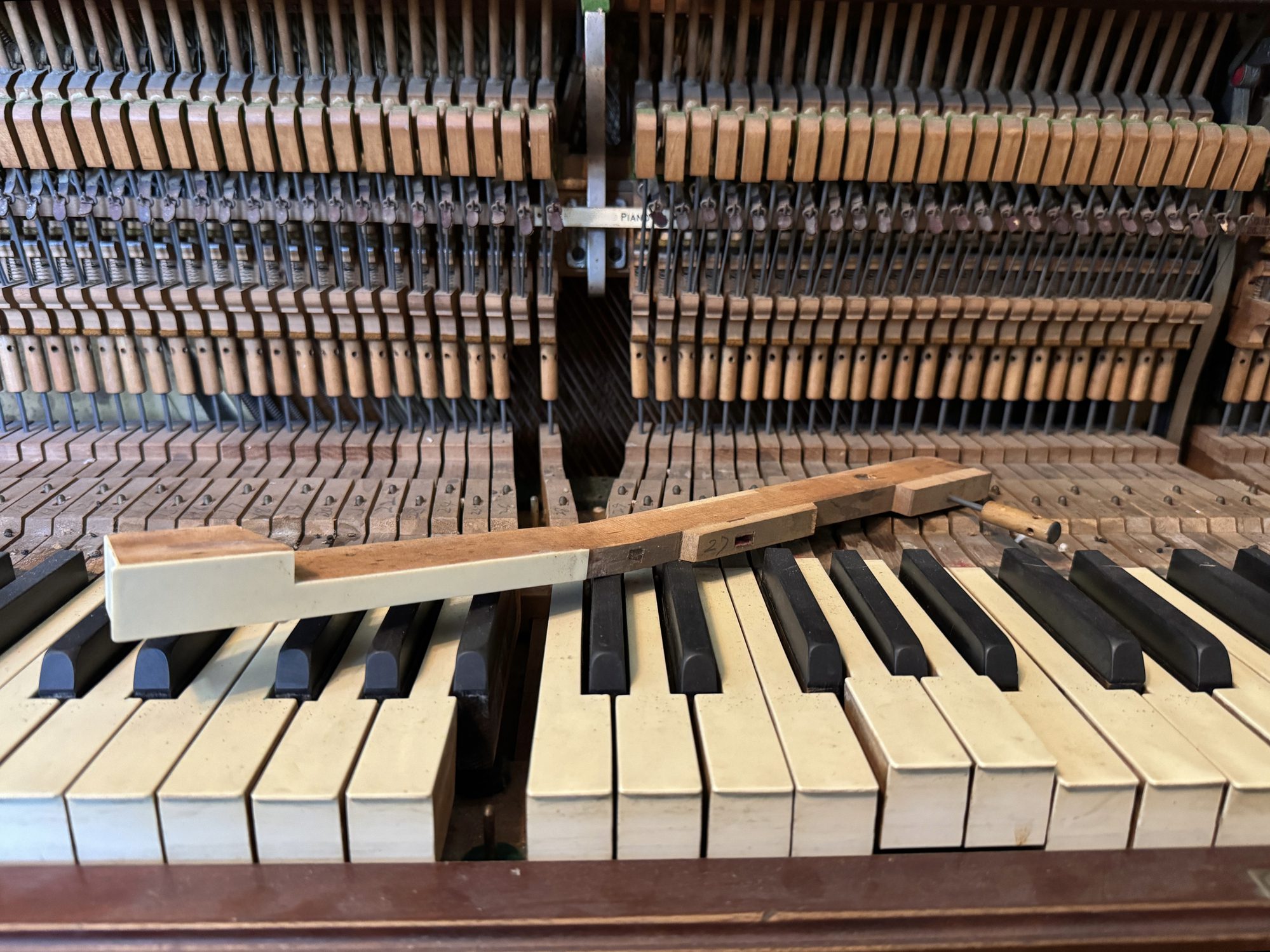 Old piano with worn-out keys